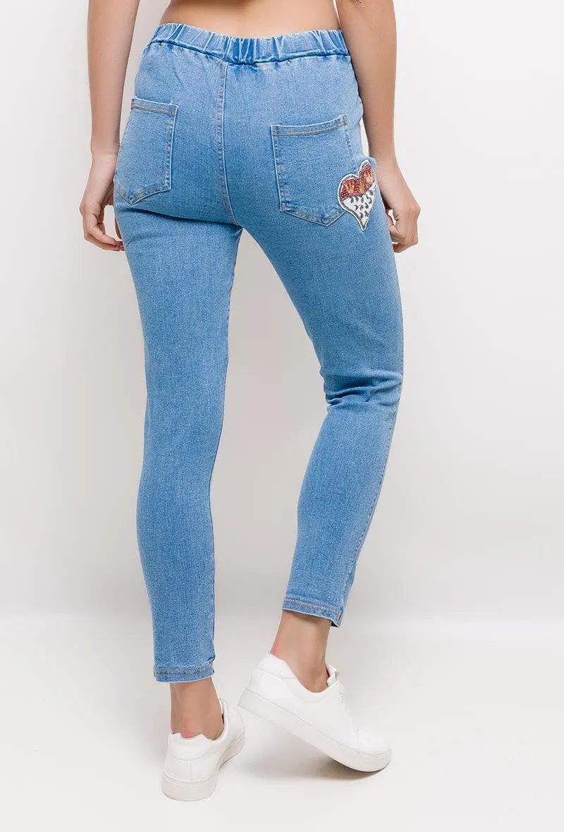 Jeans with embroidered patches
