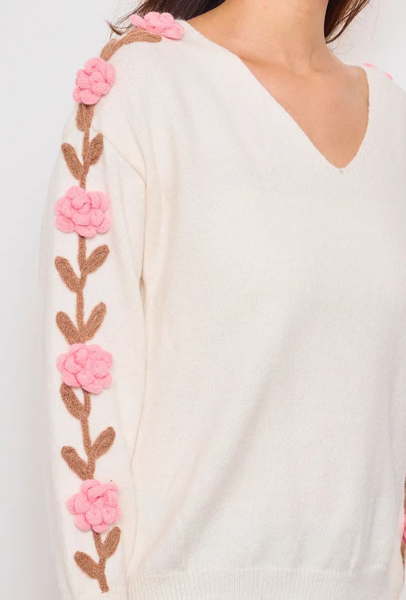 Pullover mit V-Ausschnitt und Blumenlinie an den Ärmeln
